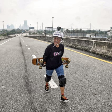 Skateboarder and cancer survivor Nongluck Chairuettichai says taking up the longboard set her on the road to recovery from breast cancer. At 63, Nongluck is the oldest member of Thailand’s longboard national team. Photo: AFP