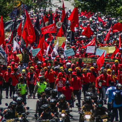Protesters in Bandung, Indonesia march against the Omnibus Law on October 20. Photo: DPA