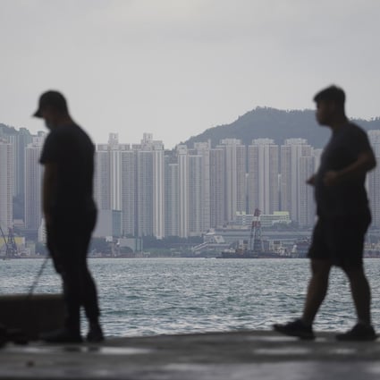 People fishing in front of private housing in East Kowloon. Photo: Winson Wong
