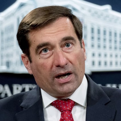 John Demers, assistant US attorney general for national security, speaks during a news conference at the Department of Justice in Washington on Monday. Photo: Bloomberg
