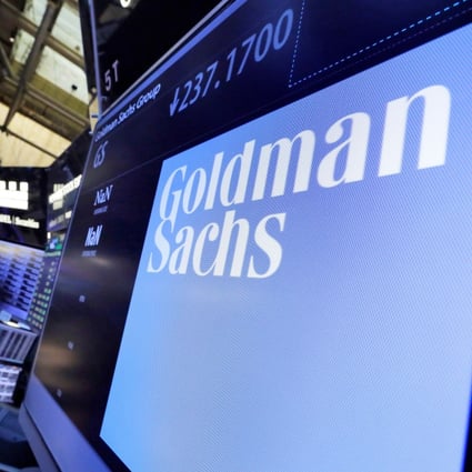 Goldman Sachs’ logo appears above a trading post on the floor of the New York Stock Exchange on December 13, 2016. Photo: AP