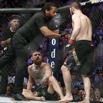 Khabib Nurmagomedov is held back by referee Herb Dean after submitting Conor McGregor at UFC 229 in Las Vegas. Photo: AP
