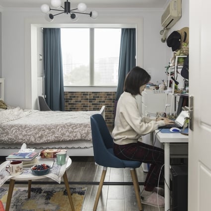 An employee works from her home in Shanghai on March 9. Asia has experienced less impact from the work-from-home revolution during the pandemic and instead could see a boom in office occupancy in the coming years as more supply becomes available. Photo: Bloomberg