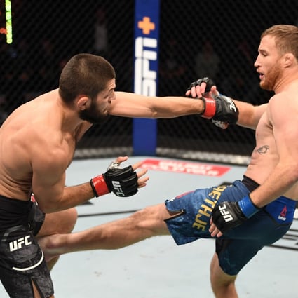 Justin Gaethje kicks Khabib Nurmagomedov in their lightweight title bout at UFC 254 on Fight Island in Abu Dhahi. Photos: Josh Hedges/Zuffa LLC via Getty Images