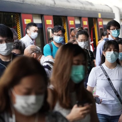 Commuters leave a train in Hong Kong. Photo: Felix Wong