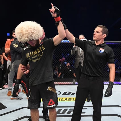 Khabib Nurmagomedov celebrates his victory over Justin Gaethje in their lightweight title bout at UFC 254 in Abu Dhabi, United Arab Emirates. Photo: Josh Hedges/Zuffa LLC via Getty Images