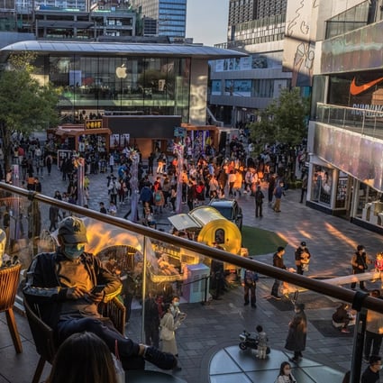 Crowds thronging Sanlitun, an upscale district in Beijing, during the Golden Week holiday. China’s post-Covid rebound is gathering momentum. Photo: EPA-EFE