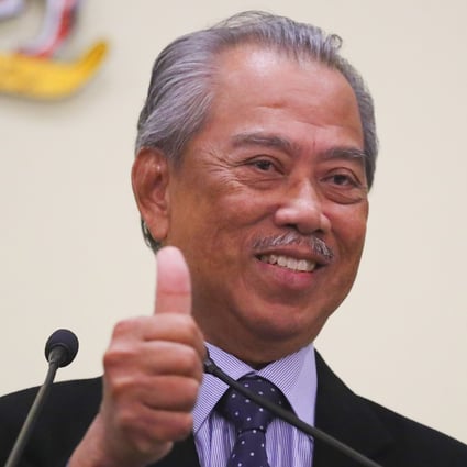 Malaysia's Prime Minister Muhyiddin Yassin gestures after the March announcement of his cabinet. Photo: EPA