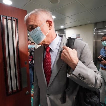 Chris Beebe, head of the Hong Kong Aircrew Officers Association, enters a meeting with the Labour Department on Tuesday. Photo: Felix Wong