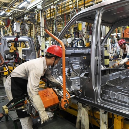 Workers assemble vehicles at a smart factory in Chongqing, a sprawling city in southwest China, on September 23. The country’s car manufacturing sector is a major market for ZKH Industrial Supply (Shanghai) Co, which runs an e-commerce platform for industrial supplies. Photo: Xinhua