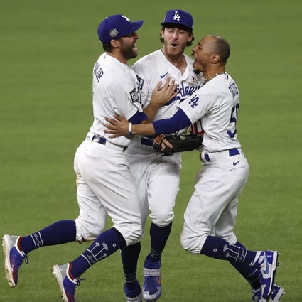 Los Angeles Dodgers players Chris Taylor, Cody Bellinger and Mookie Betts celebrate after defeating the Tampa Bay Rays in Major League Baseball’s 2020 World Series. Photo: EPA