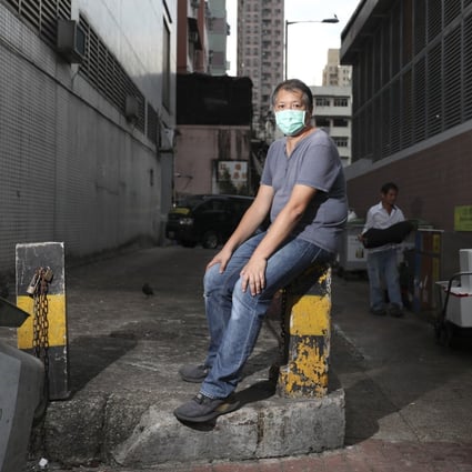 Luke Ching in Tai Po wet market, where he is working to support cleaners. Photo: SCMP / Xiaomei Chen