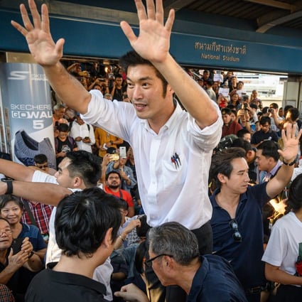 Thai politician and leader of the opposition Future Forward Party Thanathorn Juangroongruangkit addressess supporters during an unauthorised flash mob rally in Bangkok on December 14. Photo: AFP