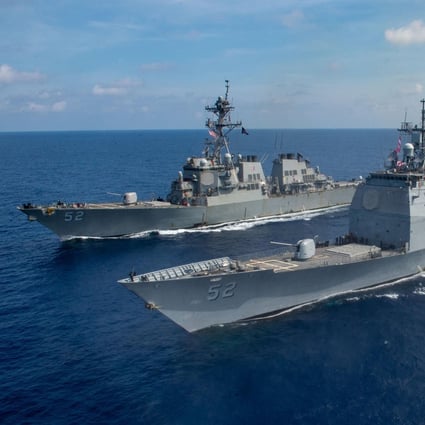 A US Navy guided missile cruisers and guided missile destroyer are seen in the South China Sea in April. The US has a defence treaty with the Philippines that commits both signatories to come to each other’s assistance if either is attacked. Photo: Handout
