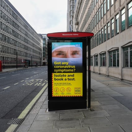 A UK government coronavirus advertisement at a bus stop in London. Photo: Bloomberg