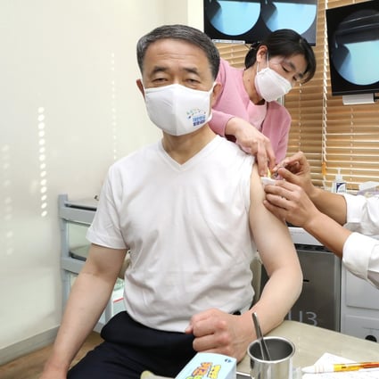 South Korean Health Minister Park Neung-hoo receiving his flu shot as part of efforts to demonstrate the safety of vaccinations administered under the state-led programme. Photo: YNA/DPA