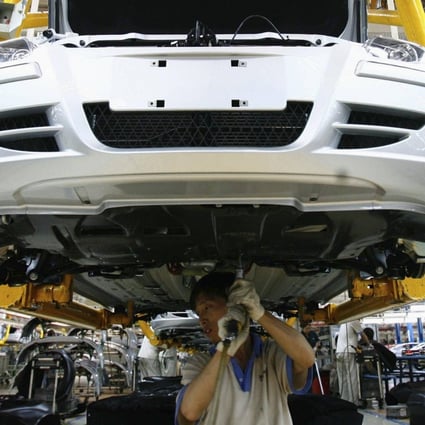 A car is assembled at a factory of Brilliance Auto in Shenyang, Liaoning province. The state-owned company has defaulted on a 1 billion yuan bond. Photo: Reuters