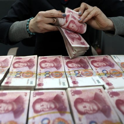 The yuan has gradually strengthened against the US dollar since the end of May, while foreign holdings of high-yield yuan-denominated bonds continue to increase. Photo: AP