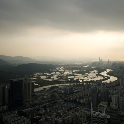 The Shenzhen River dividing Hong Kong from Shenzhen. “One country, two systems” was designed to keep Hong Kong’s “well water” from mixing with the mainland’s “river water”. Thus, allowing Hongkongers to vote from the mainland raises complicated political questions. Photo: Reuters