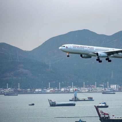 A Cathay Dragon flight approaches for landing at Hong Kong International Airport on August 14 last year. Cathay Pacific shut down its subsidiary carrier as part of a massive restructuring. Photo: EPA-EFE