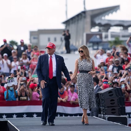 US President Donald Trump and first lady Melania Trump leave after speaking at a rally on Thursday in Tampa, Florida. Photo: AFP