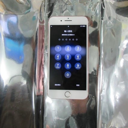 Meng Wanzhou's Apple iPhone that was seized at Vancouver's airport on December 1, 2018. It is seen resting on a Mylar bag, designed to prevent its contents from being remotely wiped or altered. Photo: BC Supreme Court exhibit