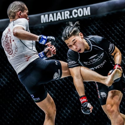 Strawweight champ Xiong Jingnan catches Tiffany Teo at Inside the Matrix. Photos: ONE Championship