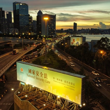 A large banner promoting the National Security Law in Quarry Bay in June. SCMP / Sun Yeung