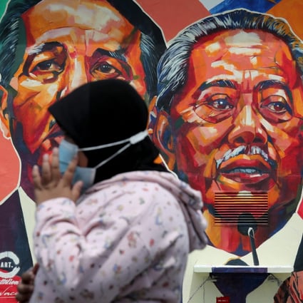 A mural depicting Malaysia's Prime Minister Muhyiddin Yassin in Kuala Lumpur. Photo: Reuters