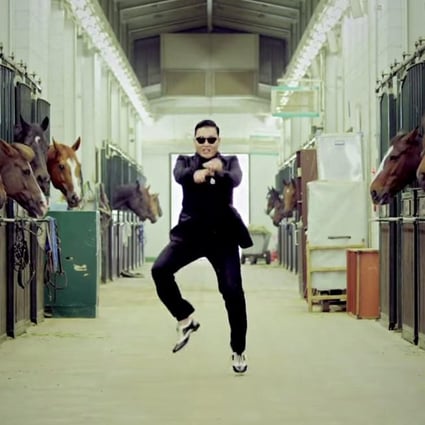 Psy (pictured) in the video of the viral 2012 hit Gangnam Style. The South Korean singer is teaming up with J.Y. Park of JYP Entertainment on a new boy band project.
