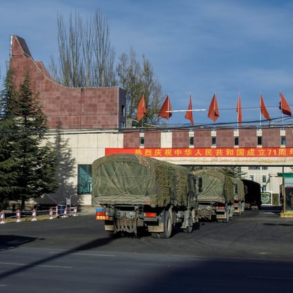 PLA trucks from the infantry brigade move into an army base near Lhasa in the Tibet Autonomous Region last month. The Chinese military is looking at buying hi-tech devices, weapons and clothing from private firms to boost its operation against India. Photo: Reuters