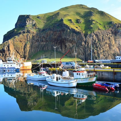 The harbour at Heimaey in Iceland – one of many small island getaways, albeit not tropical or desert. The local delicacy is stuffed puffin breast. Photo: Shutterstock