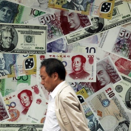 An advertisement promoting China's renminbi (RMB), US dollars and euros at a money changer in Hong Kong on July 26, 2011. Photo: Reuters