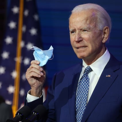 US President-elect Joe Biden has touted the idea of a nationwide mask order, but experts say that a federal command could face legal challenges and would be difficult to enforce. Photo: Reuters