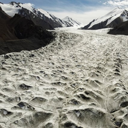 Melt water flows over the Laohugou No 12 glacier in Subei Mongol Autonomous County in Gansu province, China, in September 2020. Glaciers in China's bleak, rugged Qilian mountains are disappearing at a shocking rate, scientists say. Photo: Reuters