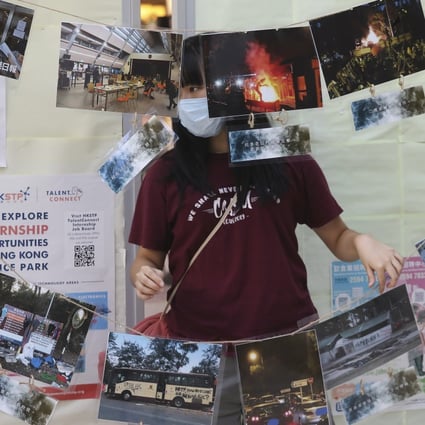 Photos showing last year’s occupation of the Chinese University campus are displayed in an exhibition organised by the student union. Photo: K. Y. Cheng