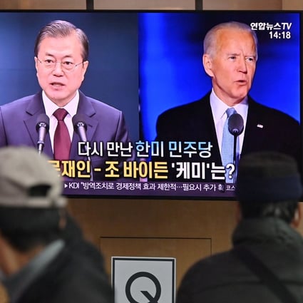 Coverage of the call between South Korean President Moon Jae-in and US President-elect Joe Biden. Photo: AFP