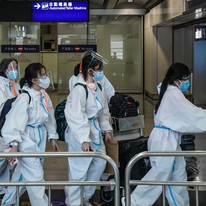 Travellers at Hong Kong International Airport. Photo: Bloomberg