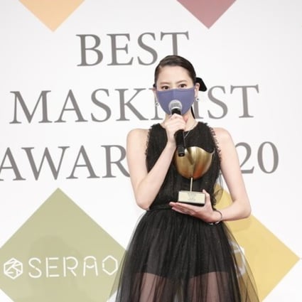 Japanese actress Mayuko Kawakita picks up a Best Masknist Award. Photo: Handout