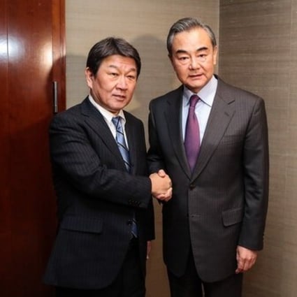 China’s Foreign Minister Wang Yi (right) may visit Tokyo to meet his Japanese counterpart Toshimitsu Motegi (left) later this month. Photo: Handout