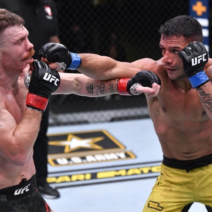 Brazil’s Rafael Dos Anjos (right) aims a punch at Paul Felder in their lightweight fight at UFC Vegas 14. Photos: Jeff Bottari/Zuffa LLC