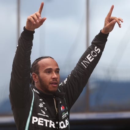 Mercedes driver Lewis Hamilton of Britain reacts after winning the Formula One Turkish Grand Prix at the Istanbul Park circuit racetrack in Istanbul. Photo: AP