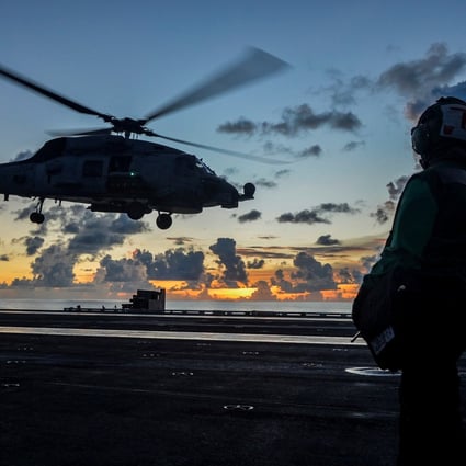 A Sea Hawk helicopter lifts off from the American aircraft carrier USS Ronald Reagan during an exercise in the South China Sea in July. Photo: Reuters