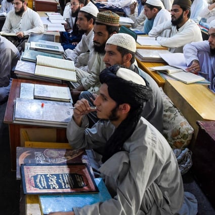 Islamic seminary students attend class at the Darul Uloom Haqqania seminary in Akora Khattak. Photo: AFP