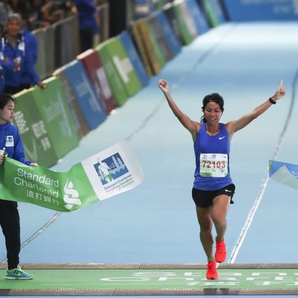 Christy Yiu wins the half marathon at the 2019 Standard Chartered Hong Kong Marathon. Photo: Nora Tam