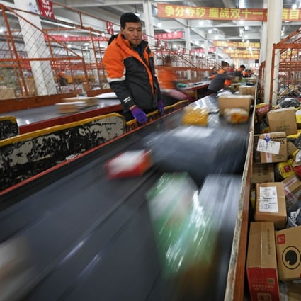 Staff members work at the distribution center of an express delivery company in Yinchuan, northwest China. Photo: Xinhua
