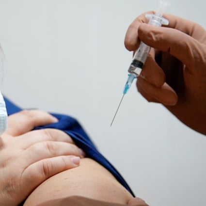 A health worker at a regional hospital receives Russia’s Sputnik V vaccine shot in Tver, Russia in October. Photo: Reuters