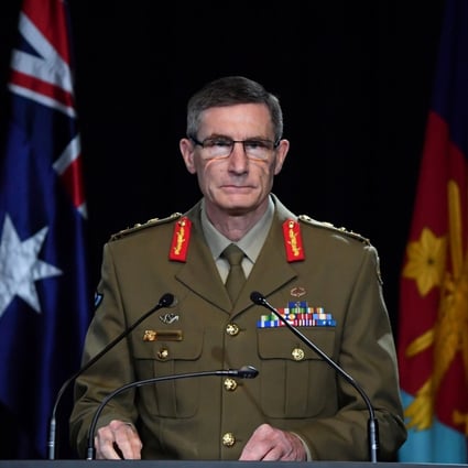 Chief of the Australian Defence Force General Angus Campbell delivers the findings from the Afghanistan inquiry. Photo: AFP