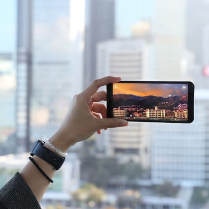 Users can download the app for free to see Hong Kong from two time periods during the 20-minute ride . Photo: Edmond So