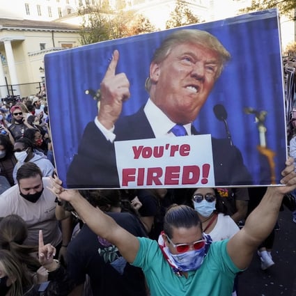 People gather to celebrate Joe Biden’s election win over US President Donald Trump on November 7 in Washington. Photo: AP